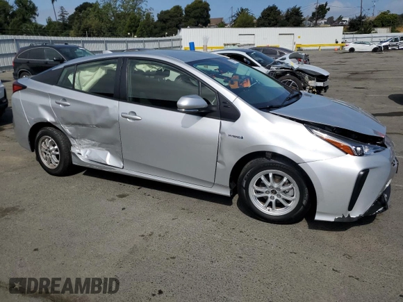 2021 Toyota Prius L Eco with VIN JTDKAMFUXM3130587, listed as a Copart auction lot 53167245 with 11,560 mi miles and Salvage title. Bid and sale history available at DreamBid. Image 4.