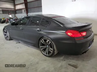 2016 BMW M6 z VIN WBS6E9C53GGF92658, wystawiony jako Copart lot #79003953 z przebiegiem 49 231 mil mil oraz . Historia ofert i sprzedaży dostępna na DreamBid. Obrazek 2.