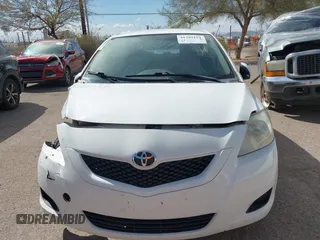 2012 Toyota Yaris with VIN JTDBT4K31CL027631, listed as a IAAI auction lot 41799191 with Not Provided miles and . Bid and sale history available at DreamBid. Image 11.