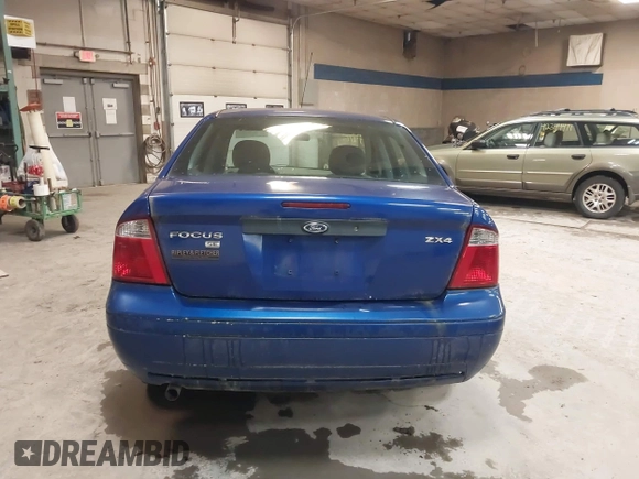 2006 Ford Focus S z VIN 1FAFP34N66W232191, wystawiony jako IAAI lot #42319916 z przebiegiem 51 438 mil mil oraz . Historia ofert i sprzedaży dostępna na DreamBid. Obrazek 15.