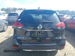 2017 Nissan Rogue S with VIN JN8AT2MV2HW013018, listed as a IAAI auction lot 41693946 with 128,667 mi miles and . Bid and sale history available at DreamBid. Image 17.