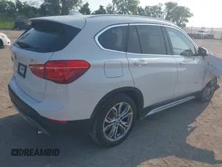 2016 BMW X1 xDrive28i z VIN WBXHT3Z37G4A48242, wystawiony jako IAAI lot #42473404 z przebiegiem 34 309 mil mil oraz . Historia ofert i sprzedaży dostępna na DreamBid. Obrazek 4.