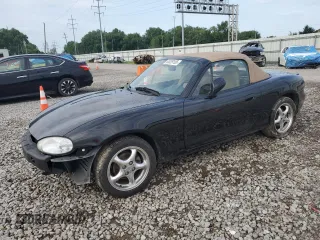 1999 Mazda MX-5 Miata with VIN JM1NB3537X0112759, listed as a Copart auction lot 65339195 with 75,412 mi miles and Salvage title. Bid and sale history available at DreamBid. Image 1.
