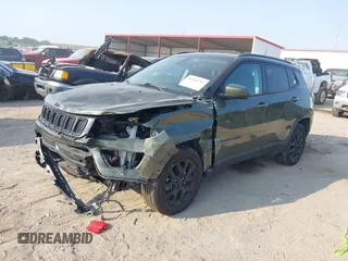 2021 Jeep Compass Sport with VIN 3C4NJDAB2MT591225, listed as a IAAI auction lot 40304781 with 63,948 mi miles and . Bid and sale history available at DreamBid. Image 17.