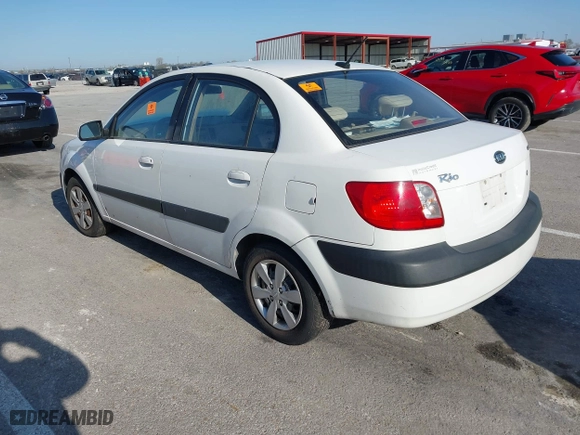 2009 Kia Rio SX with VIN KNADE223696518580, listed as a IAAI auction lot 41990650 with 1 mi miles. Bid and sale history available at carsss.com. Image 3.