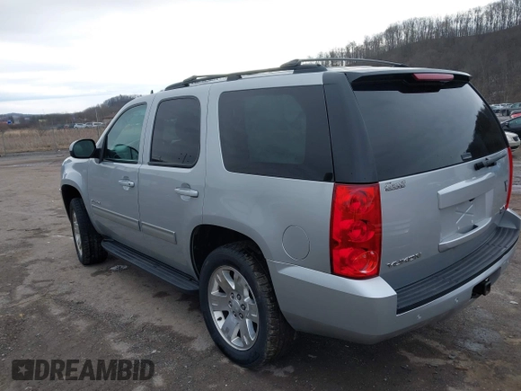2013 GMC Yukon SLT with VIN 1GKS2CE07DR315820, listed as a IAAI auction lot 41653433 with 137,491 mi miles. Bid and sale history available at carsss.com. Image 3.