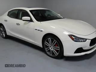 2014 Maserati Ghibli S Q4 z VIN ZAM57RTA7E1094580, wystawiony jako Copart lot #58866195 z przebiegiem 79 463 mil mil oraz Szkody całkowita. Historia ofert i sprzedaży dostępna na DreamBid. Obrazek 1.