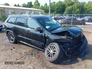 2018 Jeep Grand Cherokee Trailhawk with VIN 1C4RJFLG4JC241057, listed as a IAAI auction lot 42416590 with 81,822 mi miles and . Bid and sale history available at DreamBid. Image 1.