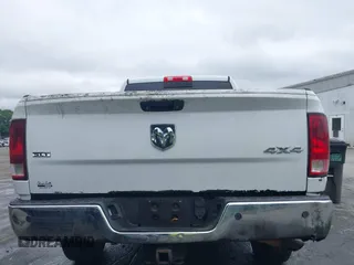 2013 Ram 2500 SLT z VIN 3C6TR5DT7DG524758, wystawiony jako IAAI lot #42333873 z przebiegiem Nie podano mil oraz . Historia ofert i sprzedaży dostępna na DreamBid. Obrazek 17.