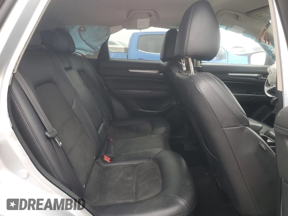 2020 Mazda CX-5 Touring z VIN JM3KFBCM2L0768348, wystawiony jako Copart lot #87813065 z przebiegiem Nie podano mil oraz Szkoda całkowita • Salvage title. Historia ofert i sprzedaży dostępna na DreamBid. Obrazek 11.