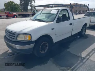 2000 Ford F-150 XL with VIN 1FTZF1724YNB21874, listed as a IAAI auction lot 42489948 with 117,906 mi miles and . Bid and sale history available at DreamBid. Image 2.