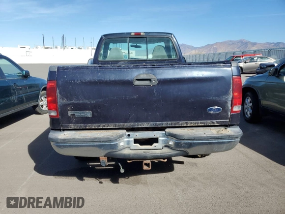 1999 Ford F-250 with VIN 1FTNF21S1XED16309, listed as a Copart auction lot 77267764 with 216,158 mi miles and Clean title. Bid and sale history available at DreamBid. Image 6.