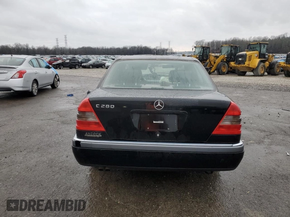 1996 Mercedes-Benz C with VIN WDBHA28E7TF328169, listed as a Copart auction lot 83653124 with 282,232 mi miles and Salvage Title. Bid and sale history available at carsss.com. Image 6.