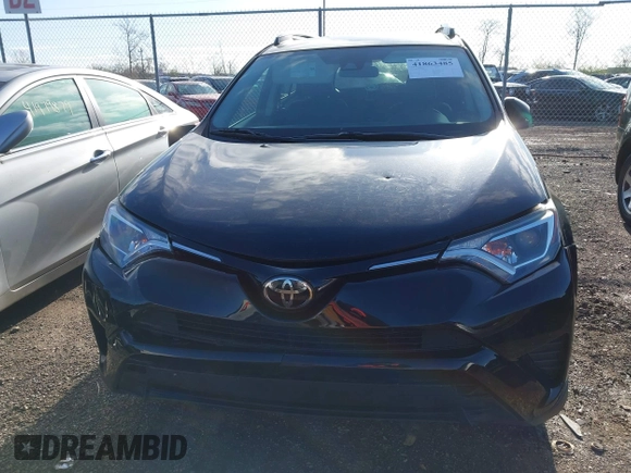 2018 Toyota RAV4 LE with VIN 2T3BFREV8JW706999, listed as a IAAI auction lot 41863485 with 115,589 mi miles. Bid and sale history available at carsss.com. Image 12.