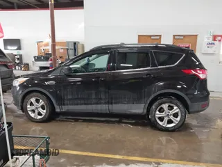 2013 Ford Escape SE with VIN 1FMCU9GX6DUC07446, listed as a IAAI auction lot 41089866 with 119,018 mi miles. Bid and sale history available at carsss.com. Image 14.