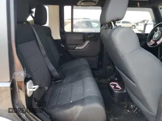 2012 Jeep Wrangler Unlimited Sport with VIN 1C4BJWDG8CL116811, listed as a Copart auction lot 59372085 with 95,498 mi miles and Salvage title. Bid and sale history available at DreamBid. Image 10.