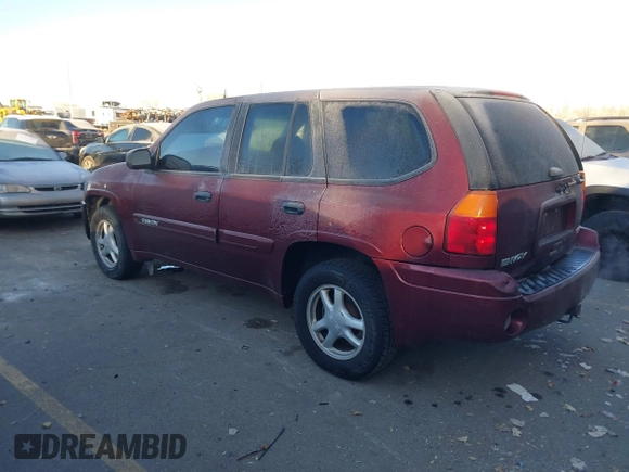 2005 GMC Envoy SLT with VIN 1GKDT13S452115924, listed as a IAAI auction lot 41443704 with 215,402 mi miles. Bid and sale history available at carsss.com. Image 3.