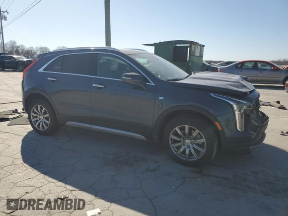 2021 Cadillac XT4 AWD Premium Luxury with VIN 1GYFZDR47MF002175, listed as a Copart auction lot 48303665 with 94,698 mi miles and Salvage Title. Bid and sale history available at carsss.com. Image 4.