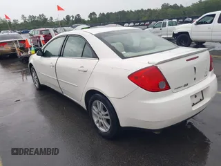 2006 Pontiac G6 6-Cyl z VIN 1G2ZG558364172091, wystawiony jako IAAI lot #42377332 z przebiegiem 199 495 mil mil oraz . Historia ofert i sprzedaży dostępna na DreamBid. Obrazek 3.