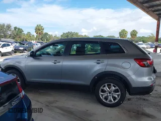 2015 Mazda CX-9 Sport with VIN JM3TB2BA0F0447436, listed as a IAAI auction lot 42480482 with 127,557 mi miles and . Bid and sale history available at DreamBid. Image 14.