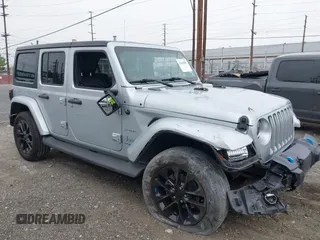 2022 Jeep Wrangler Unlimited Sahara with VIN 1C4JJXP6XNW205365, listed as a IAAI auction lot 42443007 with 52,921 mi miles and . Bid and sale history available at DreamBid. Image 1.