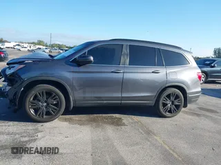 2022 Honda Pilot Special Edition with VIN 5FNYF5H25NB031399, listed as a IAAI auction lot 41638517 with 34,239 mi miles and . Bid and sale history available at carsss.com. Image 15.