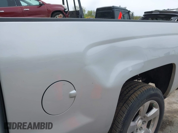 2016 Chevrolet Silverado 1500 LT with VIN 1GCVKREC1GZ228201, listed as a IAAI auction lot 42136420 with 112,101 mi miles and . Bid and sale history available at DreamBid. Image 6.