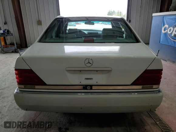 1992 Mercedes-Benz S 320 z VIN WDBGA32E4NA019320, wystawiony jako Copart lot #55062305 z przebiegiem 163 212 mil mil oraz Szkoda całkowita • Salvage title. Historia ofert i sprzedaży dostępna na DreamBid. Obrazek 6.
