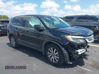 2020 Honda Pilot EX-L with VIN 5FNYF5H59LB006867, listed as a IAAI auction lot 42537418 with 57,725 mi miles and . Bid and sale history available at DreamBid. Image 1.