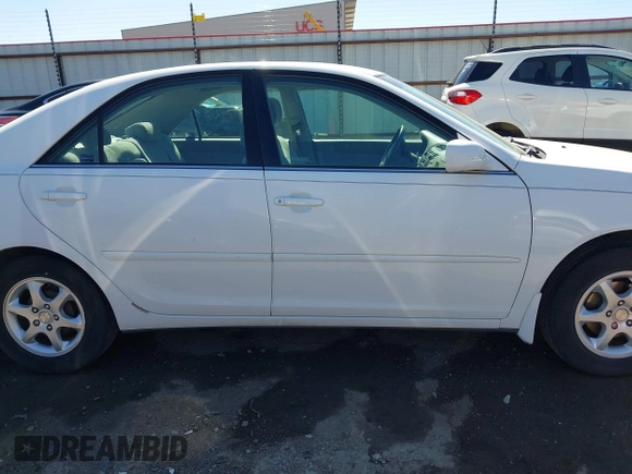 2003 Toyota Camry LE with VIN 4T1BE32K63U249910, listed as a IAAI auction lot 41719507 with 125,168 mi miles and . Bid and sale history available at DreamBid. Image 13.