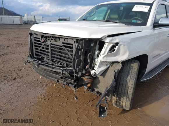 2017 Chevrolet Suburban Premier with VIN 1GNSKJKC9HR406373, listed as a IAAI auction lot 41695349 with 99,863 mi miles. Bid and sale history available at carsss.com. Image 6.