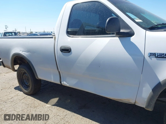 1997 Ford F-150 with VIN 1FTDF18W1VKC71272, listed as a IAAI auction lot 42736151 with 160,730 mi miles and . Bid and sale history available at DreamBid. Image 6.