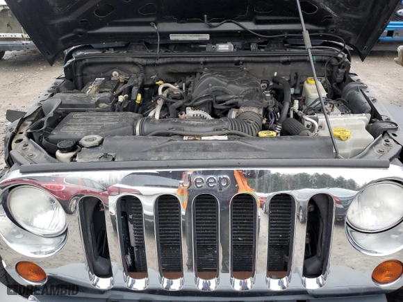 2012 Jeep Wrangler Unlimited Sport with VIN 1C4BJWDG2CL211414, listed as a Copart auction lot 83399674 with 165,617 mi miles and Non Repairable. Bid and sale history available at carsss.com. Image 12.