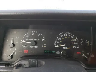 1999 Jeep Cherokee Sport z VIN 1J4FF68S8XL604061, wystawiony jako Copart lot #53175345 z przebiegiem 206 698 mil mil oraz Nie do naprawy • Non repairable. Historia ofert i sprzedaży dostępna na DreamBid. Obrazek 9.