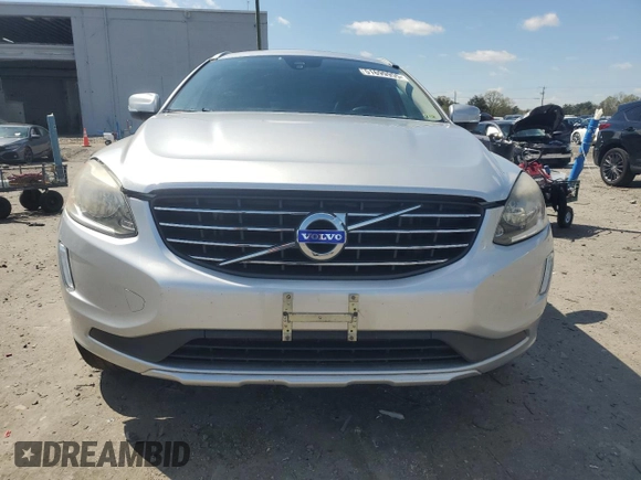 2014 Volvo XC60 R-Design Premier Plus z VIN YV4902DZ1E2543491, wystawiony jako Copart lot #51699955 z przebiegiem 114 688 mil mil oraz Szkoda całkowita • Salvage title. Historia ofert i sprzedaży dostępna na DreamBid. Obrazek 5.