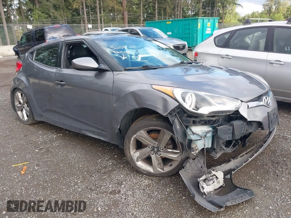 2012 Hyundai Veloster w/Gray Int z VIN KMHTC6AD9CU069416, wystawiony jako IAAI lot #42314080 z przebiegiem Nie podano mil oraz . Historia ofert i sprzedaży dostępna na DreamBid. Obrazek 1.