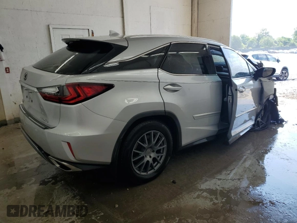 2016 Lexus RX 350 with VIN 2T2BZMCA1GC032722, listed as a Copart auction lot 59550625 with 124,611 mi miles and Salvage title. Bid and sale history available at DreamBid. Image 3.