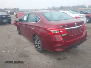 2019 Nissan Sentra S z VIN 3N1AB7AP7KY256134, wystawiony jako IAAI lot #41512289 z przebiegiem Nie podano mil oraz . Historia ofert i sprzedaży dostępna na DreamBid. Obrazek 3.