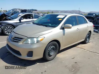 2013 Toyota Corolla L with VIN 5YFBU4EEXDP176123, listed as a IAAI auction lot 42003927 with 180,319 mi miles and . Bid and sale history available at DreamBid. Image 2.