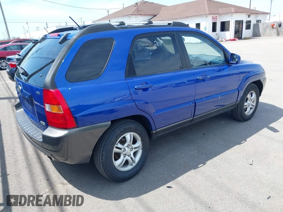 2006 Kia Sportage LX with VIN KNDJF723167214580, listed as a IAAI auction lot 42126184 with 125,434 mi miles and . Bid and sale history available at carsss.com. Image 4.