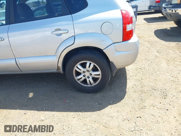 2007 Hyundai Tucson SE with VIN KM8JN12D07U632975, listed as a IAAI auction lot 42099734 with 154,320 mi miles. Bid and sale history available at carsss.com. Image 6.