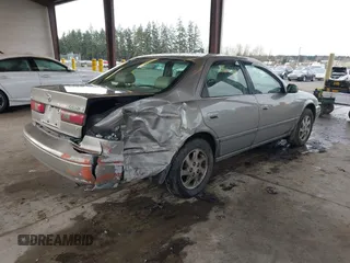 1998 Toyota Camry LE z VIN JT2BF28K1W0109514, wystawiony jako IAAI lot #41610102 z przebiegiem 161 266 mil mil oraz . Historia ofert i sprzedaży dostępna na DreamBid. Obrazek 4.