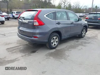 2015 Honda CR-V LX with VIN 5J6RM4H34FL031089, listed as a IAAI auction lot 42123159 with 74,566 mi miles and . Bid and sale history available at DreamBid. Image 4.