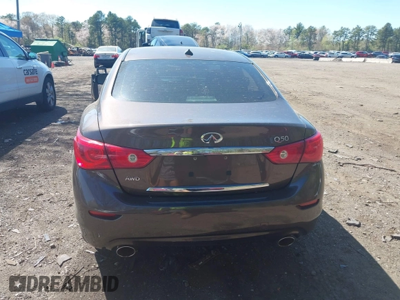 2014 Infiniti Q50 Premium with VIN JN1BV7ARXEM684719, listed as a IAAI auction lot 42122949 with 126,656 mi miles and . Bid and sale history available at DreamBid. Image 16.