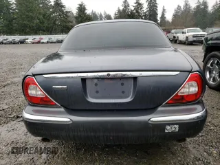 2005 Jaguar XJ VDP with VIN SAJWA82C15SG43017, listed as a Copart auction lot 83910874 with 83,352 mi miles and Salvage Title. Bid and sale history available at carsss.com. Image 6.