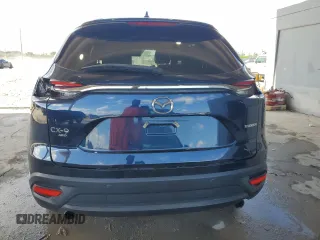 2022 Mazda CX-9 Touring Plus with VIN JM3TCBAYXN0607056, listed as a Copart auction lot 61740065 with 59,281 mi miles and Salvage title. Bid and sale history available at DreamBid. Image 6.