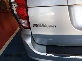 2012 Dodge Grand Caravan SXT with VIN 2C4RDGCG3CR295330, listed as a IAAI auction lot 42245978 with 167,191 mi miles and . Bid and sale history available at DreamBid. Image 1.
