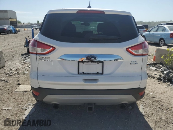 2013 Ford Escape SEL z VIN 1FMCU9H94DUC68911, wystawiony jako Copart lot #61671155 z przebiegiem 165 985 mil mil oraz Szkoda całkowita • Salvage title. Historia ofert i sprzedaży dostępna na DreamBid. Obrazek 6.
