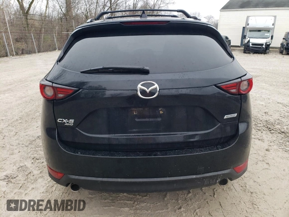 2018 Mazda CX-5 Grand Touring with VIN JM3KFBDM0J0327927, listed as a Copart auction lot 51800825 with 203,126 mi miles and Clean Title. Bid and sale history available at carsss.com. Image 6.