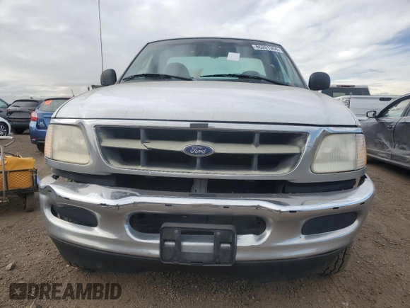 1998 Ford F-150 with VIN 1FTZF18W6WKC03783, listed as a Copart auction lot 86201354 with 160,000 mi miles and Salvage title. Bid and sale history available at DreamBid. Image 5.